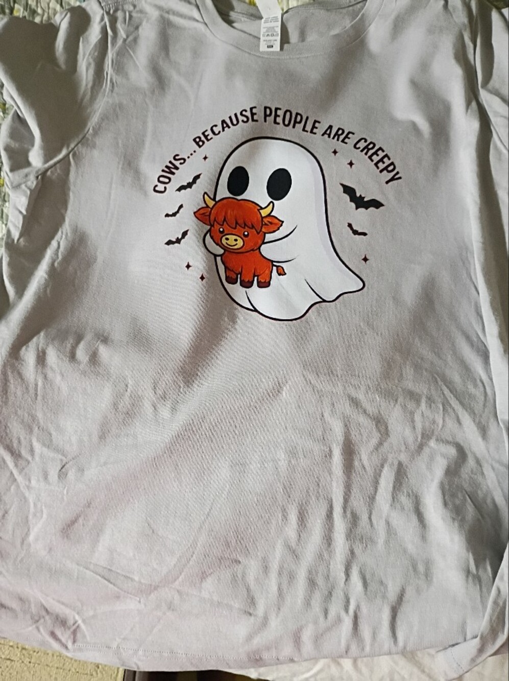 District White Tee with Ghost Hugging Orange Calf Graphic